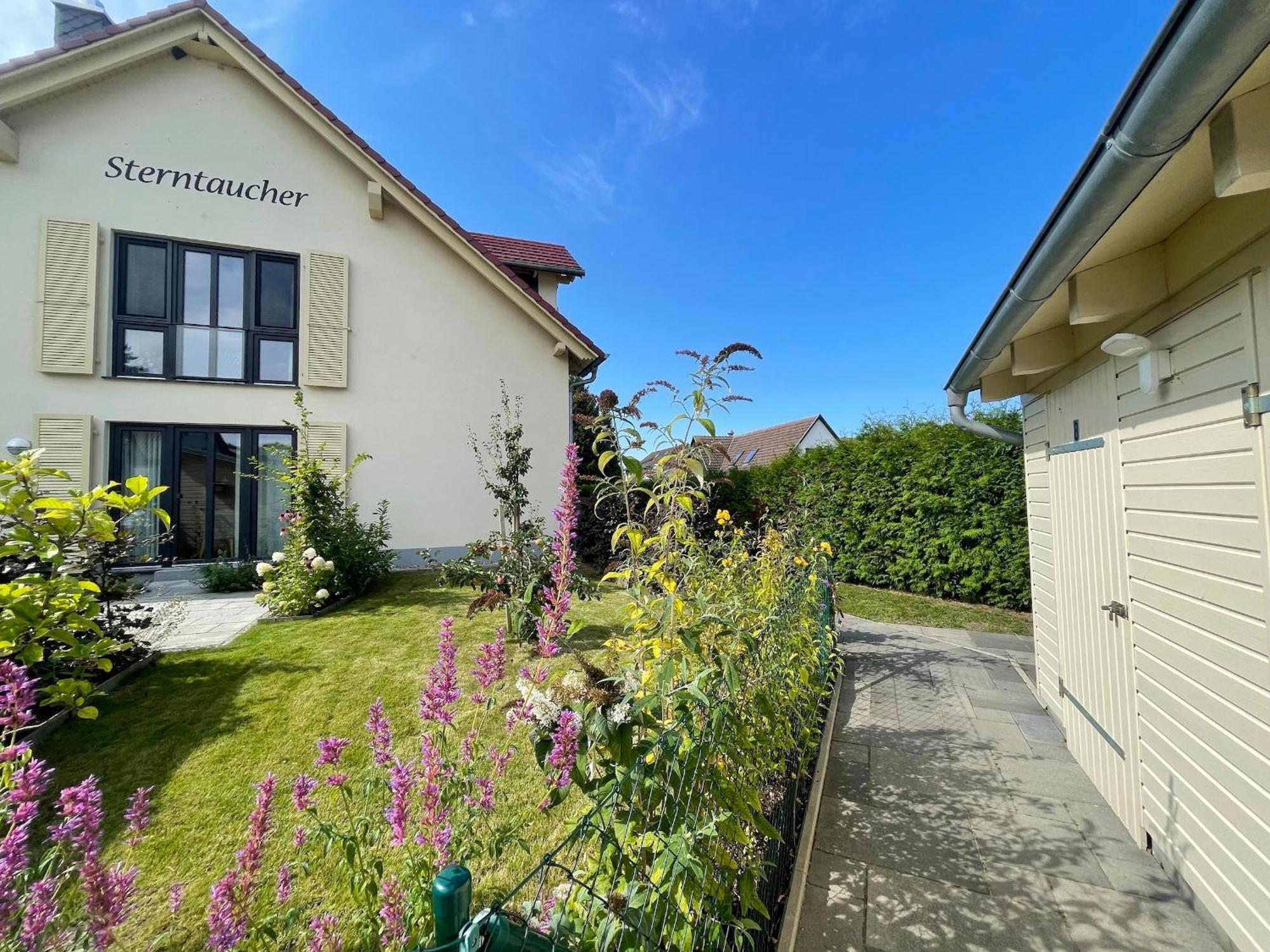 Haus Sterntaucher Ferienwohnung "Sonnenstern" Thiessow Esterno foto